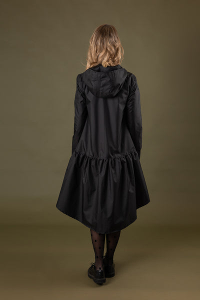 Black trapeze raincoat by Colorfall Raincoats