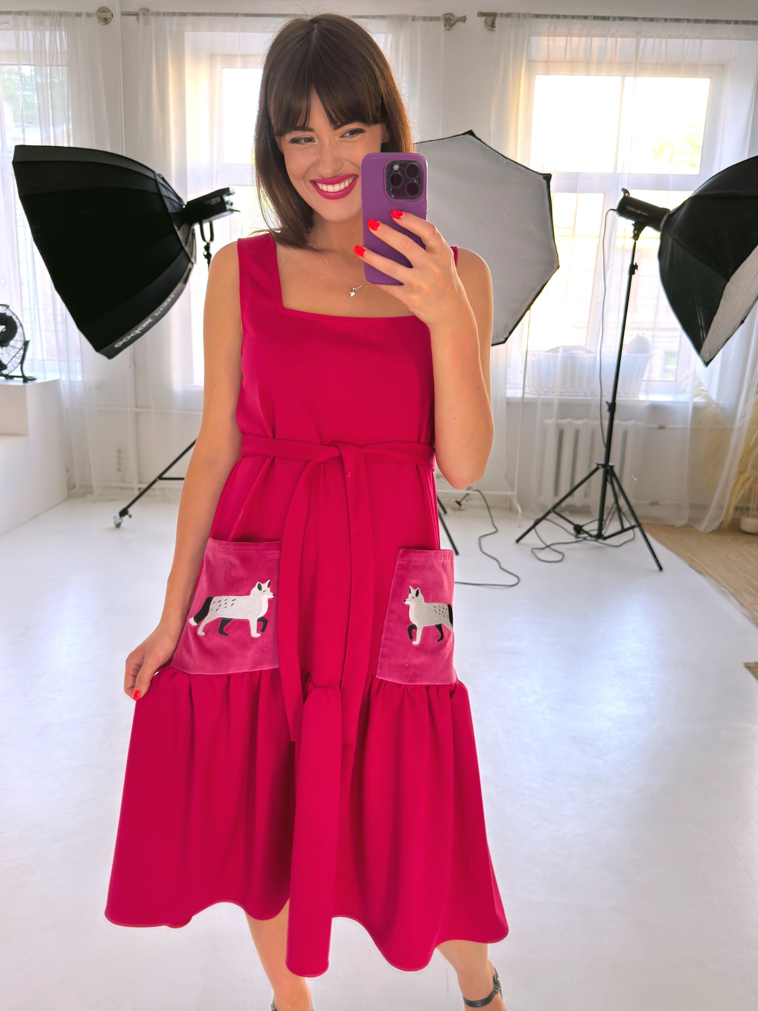 fuchsia pink dress with arctic foxes