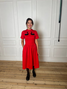 Red viscose dress with black swan embroidery